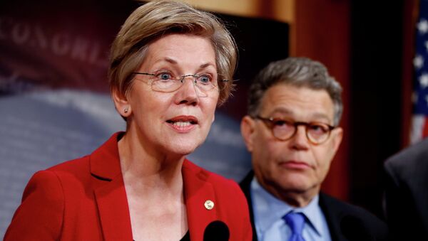 Sen. Elizabeth Warren, D-Mass, left, speaks at a new conference on Capitol Hill in Washington. - Sputnik International