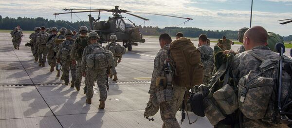 Paratroopers of 1st Battalion, 503rd Infantry Regiment, 173rd Airborne Brigade depart Lielvarde Airbase, Latvia, Sept. 8, 2014, at the conclusion of NATO Exercise Steadfast Javelin II - Sputnik International