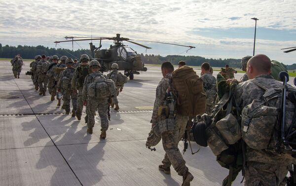 Paratroopers of 1st Battalion, 503rd Infantry Regiment, 173rd Airborne Brigade depart Lielvarde Airbase, Latvia, Sept. 8, 2014, at the conclusion of NATO Exercise Steadfast Javelin II - Sputnik International