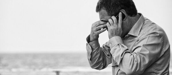 A man speaking on the phone A man speaking on the phone - Sputnik International