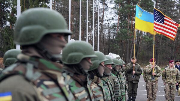 US and Ukrainian soldiers attend an opening ceremony of the joint Ukrainian-US military exercise 'Fearless Guardian' at the Yavoriv training ground - Sputnik International