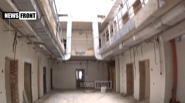 The migrant holding facility in Zhdanovka - Sputnik International