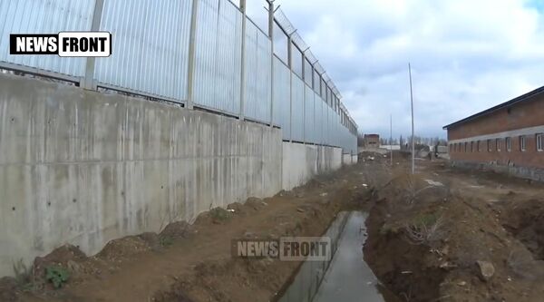 The migrant holding facility in Zhdanovka - Sputnik International