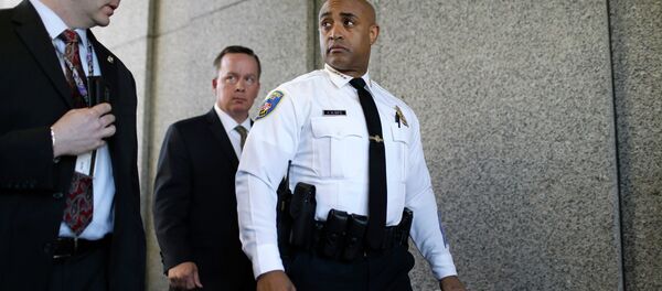 Baltimore Police Department Commissioner Anthony Batts, center, leaves a news conference after speaking about the investigation into Freddie Gray's death. Baltimore Police Department Commissioner Anthony Batts, center, leaves a news conference after speaking about the investigation into Freddie Gray's death. - Sputnik International