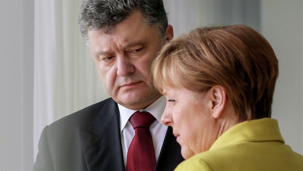 Ukrainian President Petro Poroshenko meets with German Chancellor Angela Merkel - Sputnik International