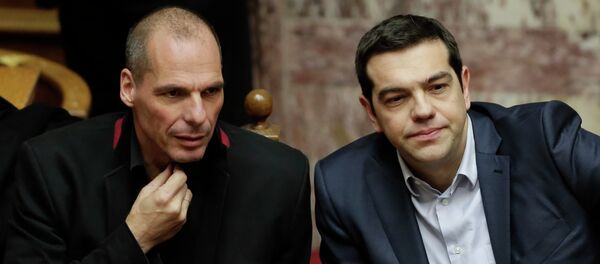 Greece's Prime Minister Alexis Tsipras, right, and Finance Minister Yanis Varoufakis attend a Presidential vote in Athens, on Wednesday, Feb. 18, 2015 - Sputnik International
