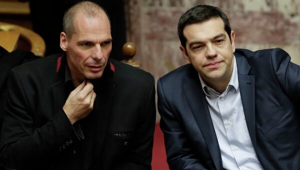 Greece's Prime Minister Alexis Tsipras, right, and Finance Minister Yanis Varoufakis attend a Presidential vote in Athens, on Wednesday, Feb. 18, 2015 - Sputnik International