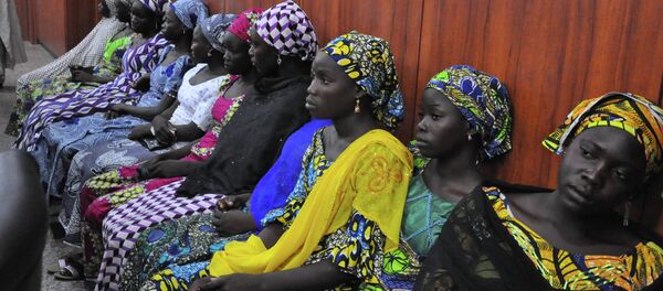 Some of the escaped Kidnapped girls of the government secondary school Chibok, attend a meeting with Borno state governor. Some of the escaped Kidnapped girls of the government secondary school Chibok, attend a meeting with Borno state governor. - Sputnik International