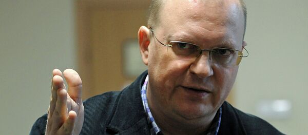 Russian journalist Leonid Sviridov speaks to the press after a three-hour meeting with officials concerning an attempt by Polish authorities to expel him from the country, in Warsaw, Poland, Wednesday, Nov. 26, 2014 - Sputnik International