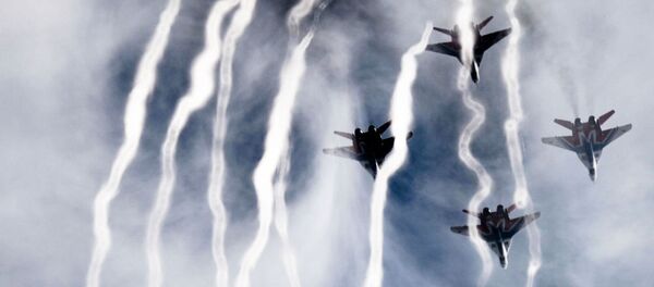 MiG-29 fighter jets from the Strizhi (Swifts) aerobatic team at the Kubinka airfield MiG-29 fighter jets from the Strizhi (Swifts) aerobatic team at the Kubinka airfield - Sputnik International