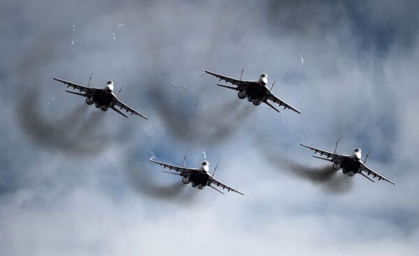 MiG-29 fighter jets from the Strizhi (Swifts) aerobatic team at the Kubinka airfield - Sputnik International