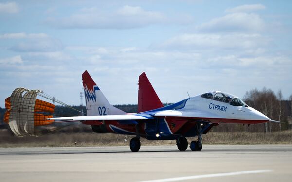 A MiG-29 fighter jet from the Strizhi (Swifts) aerobatic team at the Kubinka airfield - Sputnik International