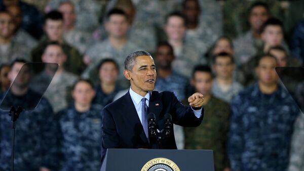 President Barack Obama speaks to military members and families Monday, Dec. 15, 2014, at Joint Base McGuire-Dix-Lakehurst, in Wrightstown, N.J. - Sputnik International