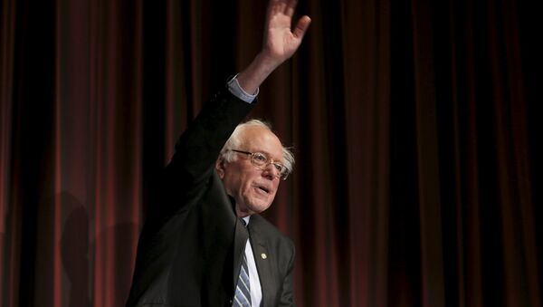 U.S. Senator Bernie Sanders (D-VT) waves to the audience before speaking at the opening of the 2015 National Action Network Convention in New York City - Sputnik International