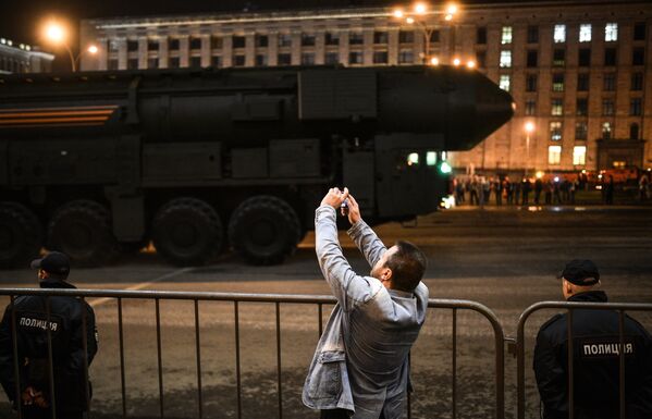 A column of military hardware is passing the Mayakovskaya metro station during the rehearsal of the Victory Day Parade - Sputnik International