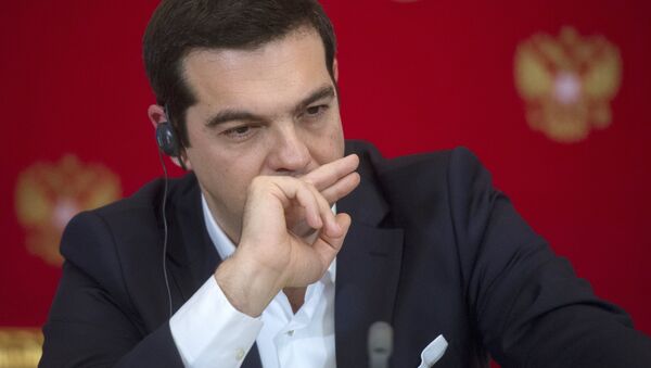 Greek Prime Minister Alexis Tsipras at the joint news conference with Russian President Vladimir Putin following their talks at the Moscow Kremlin, April 8, 2015. - Sputnik International