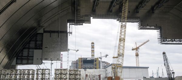 Construction is underway on the Chernobyl New Safe Confinement structure (NSC), an arch that will cover the reactor building once it is moved into position over the Chernobyl Nuclear Power plant, on February 26, 2015 Construction is underway on the Chernobyl New Safe Confinement structure (NSC), an arch that will cover the reactor building once it is moved into position over the Chernobyl Nuclear Power plant, on February 26, 2015 - Sputnik International