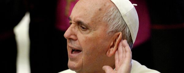 Pope Francis tries to hear during an audience with the members of Cursillos of Christianity movement in the Paul VI hall at the Vatican on April 30, 2015 Pope Francis tries to hear during an audience with the members of Cursillos of Christianity movement in the Paul VI hall at the Vatican on April 30, 2015 - Sputnik International