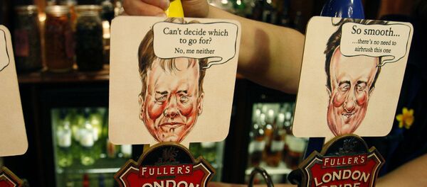 Beer pumps in a Westminster pub are coloured and decorated with the British main political party politicians. - Sputnik International