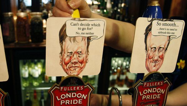 Beer pumps in a Westminster pub are coloured and decorated with the British main political party politicians. - Sputnik International
