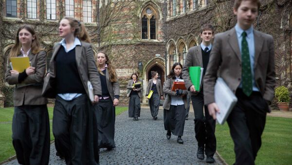 Pupils walk to lessons at Rugby School in central England, March 18, 2015 - Sputnik International