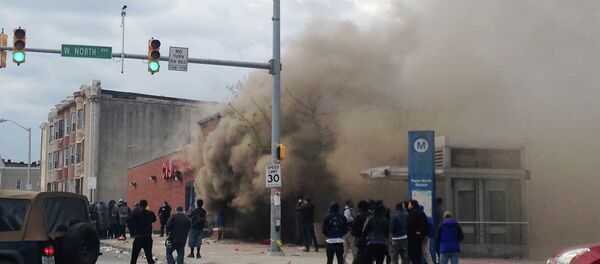 Smoke billows from a CVS Pharmacy store in Baltimore on Monday, April 27, 2015 Smoke billows from a CVS Pharmacy store in Baltimore on Monday, April 27, 2015 - Sputnik International