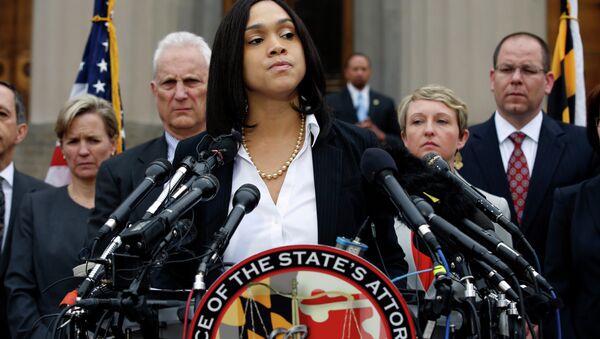 Marilyn Mosby, Baltimore state's attorney, pauses while announcing charges against the six officers involved in Gray's arrest, on Friday, May 1, 2015 in Baltimore. - Sputnik International