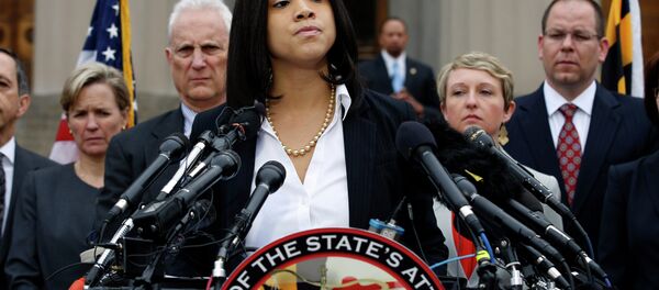 Marilyn Mosby, Baltimore state's attorney, pauses while announcing charges against the six officers involved in Gray's arrest, on Friday, May 1, 2015 in Baltimore. - Sputnik International