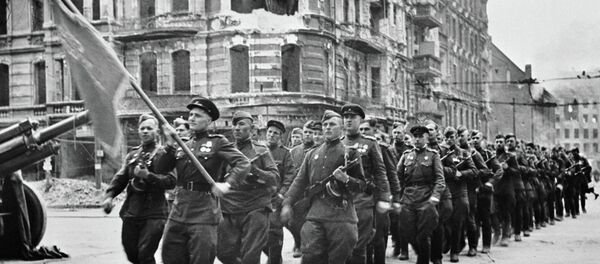 Soviet soldiers marching at the May 1 parade in Berlin Soviet soldiers marching at the May 1 parade in Berlin - Sputnik International