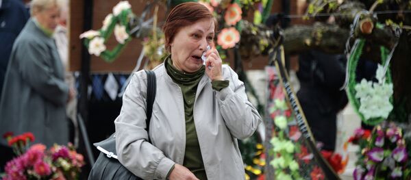 A woman cries during a gatherin in front of the Trade Union House in Odessa, southern Ukraine, on May 2, 2015, in memory of people who died in a fire at the Trade Union House in May 2014 A woman cries during a gatherin in front of the Trade Union House in Odessa, southern Ukraine, on May 2, 2015, in memory of people who died in a fire at the Trade Union House in May 2014 - Sputnik International