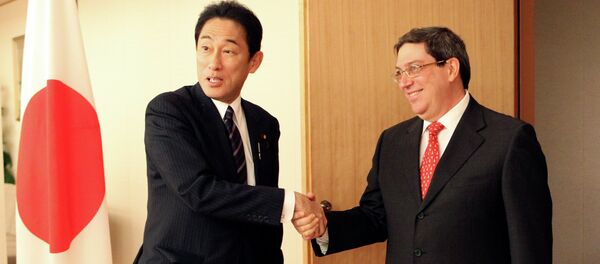 Japan's Forein Minister Fumio Kishida, left, greets his Cuba's counterpart Bruno Rodriguez Parrilla Japan's Forein Minister Fumio Kishida, left, greets his Cuba's counterpart Bruno Rodriguez Parrilla - Sputnik International