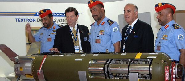 Thomas Harrington, vice president of US Textron Defense Systems, (2nd L) presents a sensor fuzed weapon CBU-105 to Emirati Major General Mohammed bin Swaidan Said al-Qamzi, Commander of UAE's Air Force and Air Defence, (3rd L) Thomas Harrington, vice president of US Textron Defense Systems, (2nd L) presents a sensor fuzed weapon CBU-105 to Emirati Major General Mohammed bin Swaidan Said al-Qamzi, Commander of UAE's Air Force and Air Defence, (3rd L) - Sputnik International