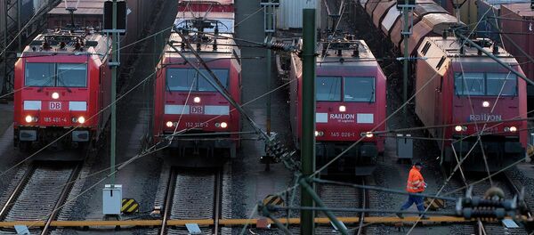 File photo of a worker passing parked locomotives in Europe's biggest marshalling yard in Maschen, near the northern German town of Hamburg, March 10, 2011. File photo of a worker passing parked locomotives in Europe's biggest marshalling yard in Maschen, near the northern German town of Hamburg, March 10, 2011. - Sputnik International