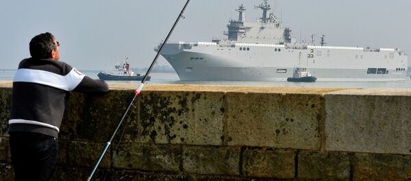 The Mistral-class warship 'Sevastopol', headed out for its first sea trials off Saint-Nazaire, France, March 16, 2015. - Sputnik International