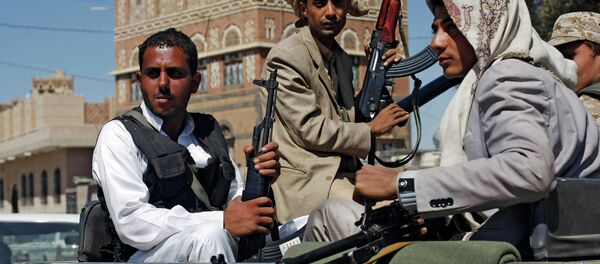 Houthi Shiite rebels ride in a military truck while patrolling a street in Sanaa, Yemen Houthi Shiite rebels ride in a military truck while patrolling a street in Sanaa, Yemen - Sputnik International