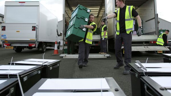 City council workers assemble ballot boxes for distribution ahead of tomorrow's general election, in Glasgow, Scotland, Britain, May 6, 2015 - Sputnik International
