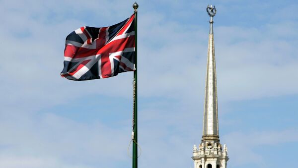 British national flag flutters in front of the British Embassy is seen in downtown Moscow - Sputnik International