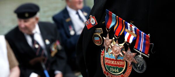 Pinned medals are pictured on the jacket of a British WWII veteran during a joint D-Day landings commemoration with US counterparts at Portsmouth Historic Dockyard Pinned medals are pictured on the jacket of a British WWII veteran during a joint D-Day landings commemoration with US counterparts at Portsmouth Historic Dockyard - Sputnik International