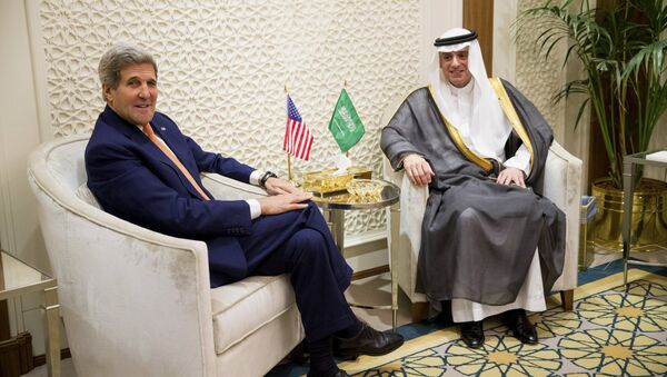 U.S. Secretary of State John Kerry, left, meets with Saudi Foreign Minister Adel al-Jubeir, right, at the Saudi Ministry of Foreign Affairs, in Riyadh, Saudi Arabia, Thursday, May 7, 2015 - Sputnik International
