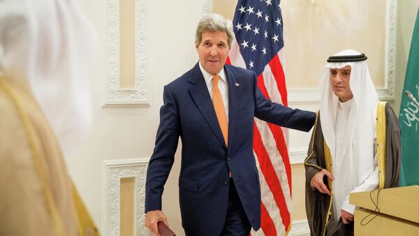 U.S. Secretary of State John Kerry, left, and Saudi Foreign Minister Adel al-Jubeir, right, leave after a joint news conference at Riyadh Air Base in Saudi Arabia, Thursday, May 7, 2015 - Sputnik International