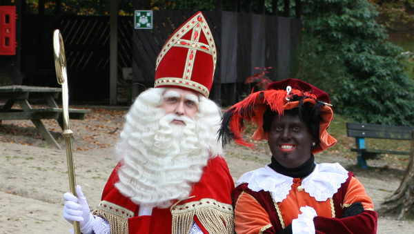 In the Netherlands, black-faced helpers called Zwarte Piet (Black Pete) assist Santa Claus. The custom has been condemned as racist for its use of blackface. - Sputnik International