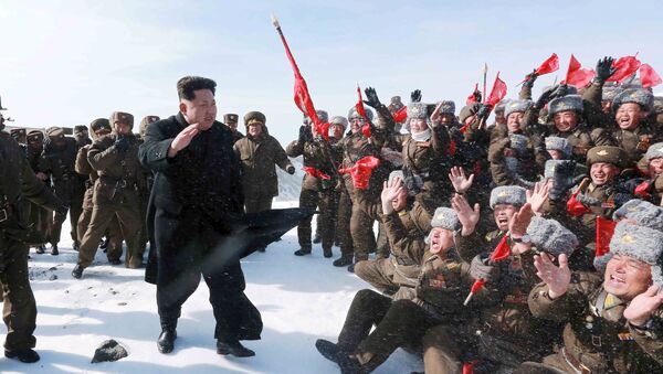 North Korean leader Kim Jong Un greets Korean People's Army pilots during a visit to the summit of Mt Paektu April 18, 2015 - Sputnik International