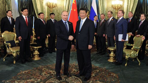 President Vladimir Putin meets with Chinese President Xi Jinping - Sputnik International