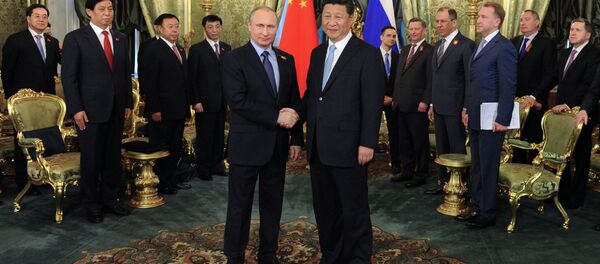 President Vladimir Putin meets with Chinese President Xi Jinping - Sputnik International