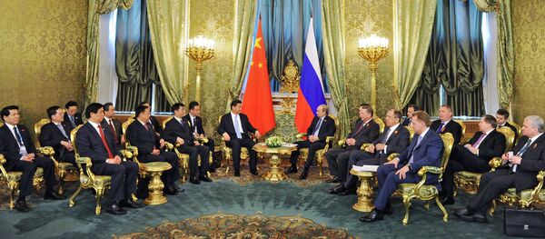President Vladimir Putin meets with Chinese President Xi Jinping - Sputnik International