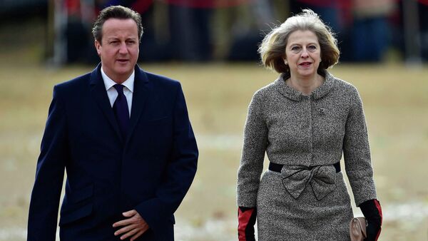 Britain's Prime Minister David Cameron (L) adn British Home Secretary Theresa May (R) - Sputnik International