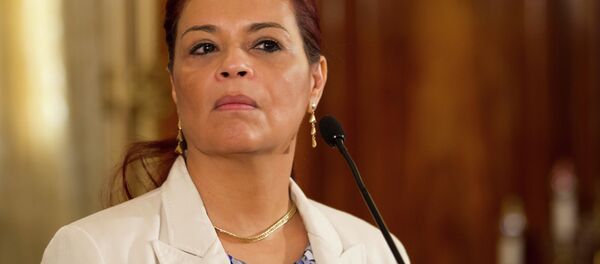 Guatemala's Vice President Roxana Baldetti listens to a question from journalists during a press conference at the presidential house in Guatemala City. Guatemala's Vice President Roxana Baldetti listens to a question from journalists during a press conference at the presidential house in Guatemala City. - Sputnik International