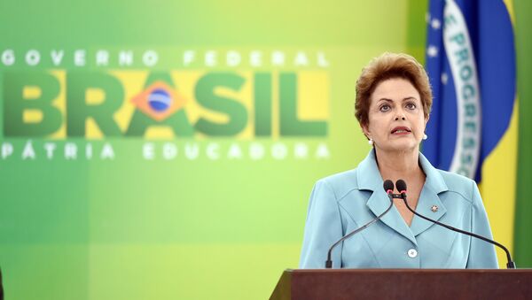 Brazilian President Dilma Rousseff delivers a speech on May 8, 2015, during a ceremony at the Planalto Palace in Brasilia to mark the 70th anniversary of the victory over Nazi Germany during World War II - Sputnik International