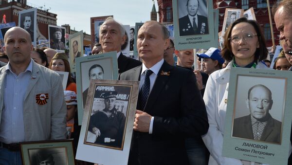 Russian President Vladimir Putin participates in march of Immortal Regiment in downtown Moscow - Sputnik International
