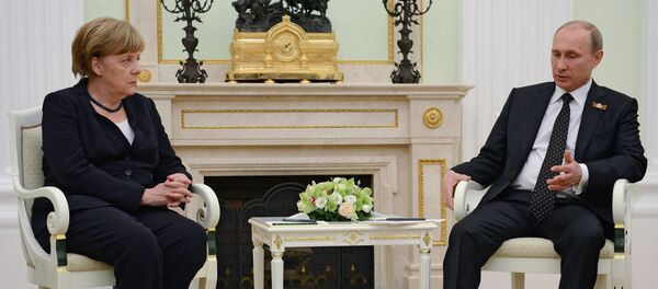 Russian President Vladimir Putin and German Chancellor Angela Merkel during meeting in the Kremlin on May 9, 2015 Russian President Vladimir Putin and German Chancellor Angela Merkel during meeting in the Kremlin on May 9, 2015 - Sputnik International